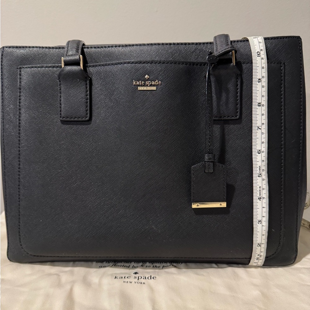 Kate Spade Elegant hard, leather Black Tote heavy duty for every day use
